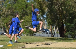 Students broad jumping